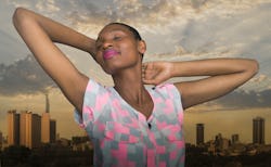 Portrait of a young woman smiling and closing  her eyes at sunset. These 3 zodiac signs will be leas...