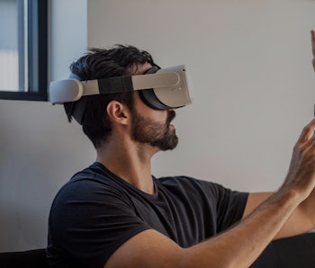 Gavin Menichini, using the Oculus Quest 2 VR headset, gives a demonstration of the Immersed Virtual ...