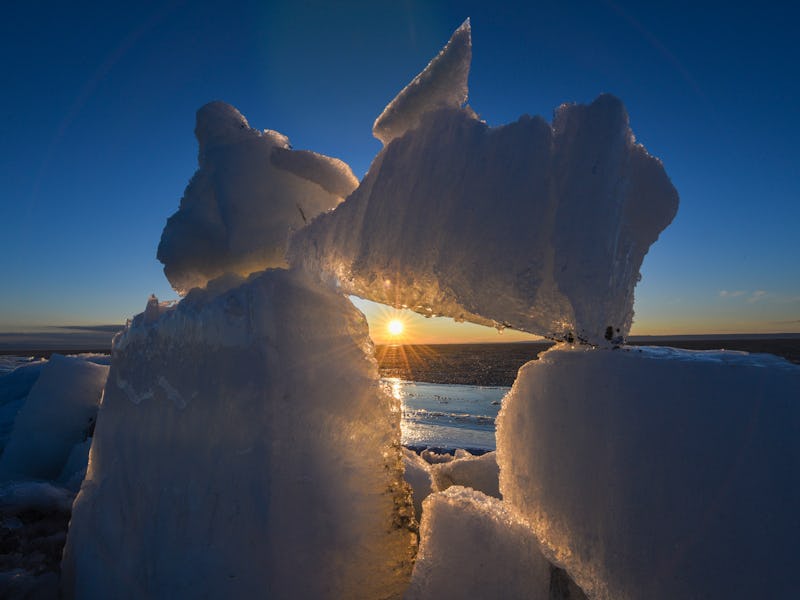 FUHAI, April 4, 2018 -- This photo taken on April 2, 2018 shows wind-driven icebergs ashore Ulunggur...