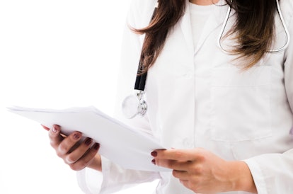 female doctor holding medical report hand isolated white backdrop