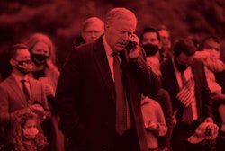 White House Chief of Staff Mark Meadows speaks on his phone as he waits for US President Donald Trum...
