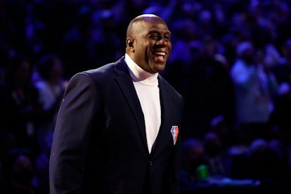 CLEVELAND, OHIO - FEBRUARY 20: Earvin "Magic" Johnson reacts after being introduced as part of the N...