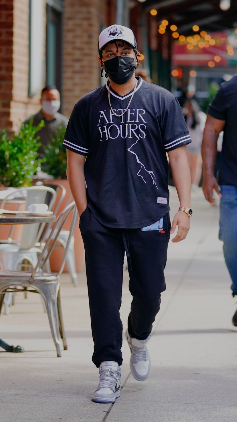 NEW YORK, NEW YORK - AUGUST 29: The Weeknd wears and 'After Hours' shirt when out and about  on Augu...