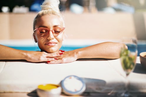 Relaxing and sunbathing in the pool.
