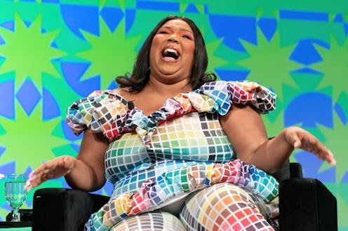 Grammy-winning singer, rapper, songwriter and flutist Lizzo appears on stage during the keynote sess...