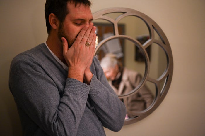 Matthew White, holding his hands to his mouth. White is one of 50 individuals who learned he is biol...