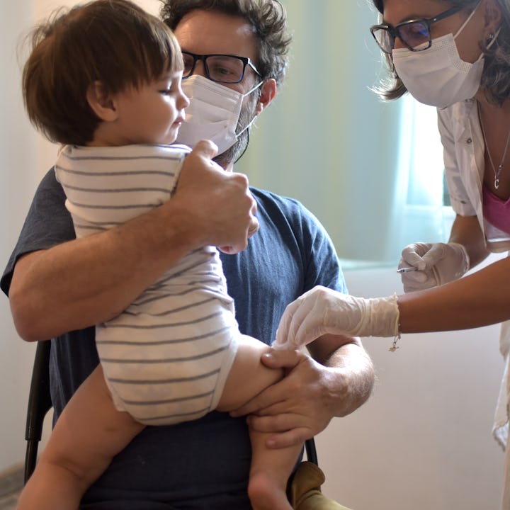 A toddler about to get a routine vaccination. Public health experts warn that not enough kids are ca...