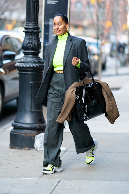 Tracee Ellis Ross in neon sneakers and a pantsuit 