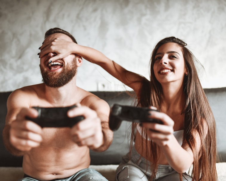 Jealous Female Closing Boyfriends Eyes To Beat Him At Video Game