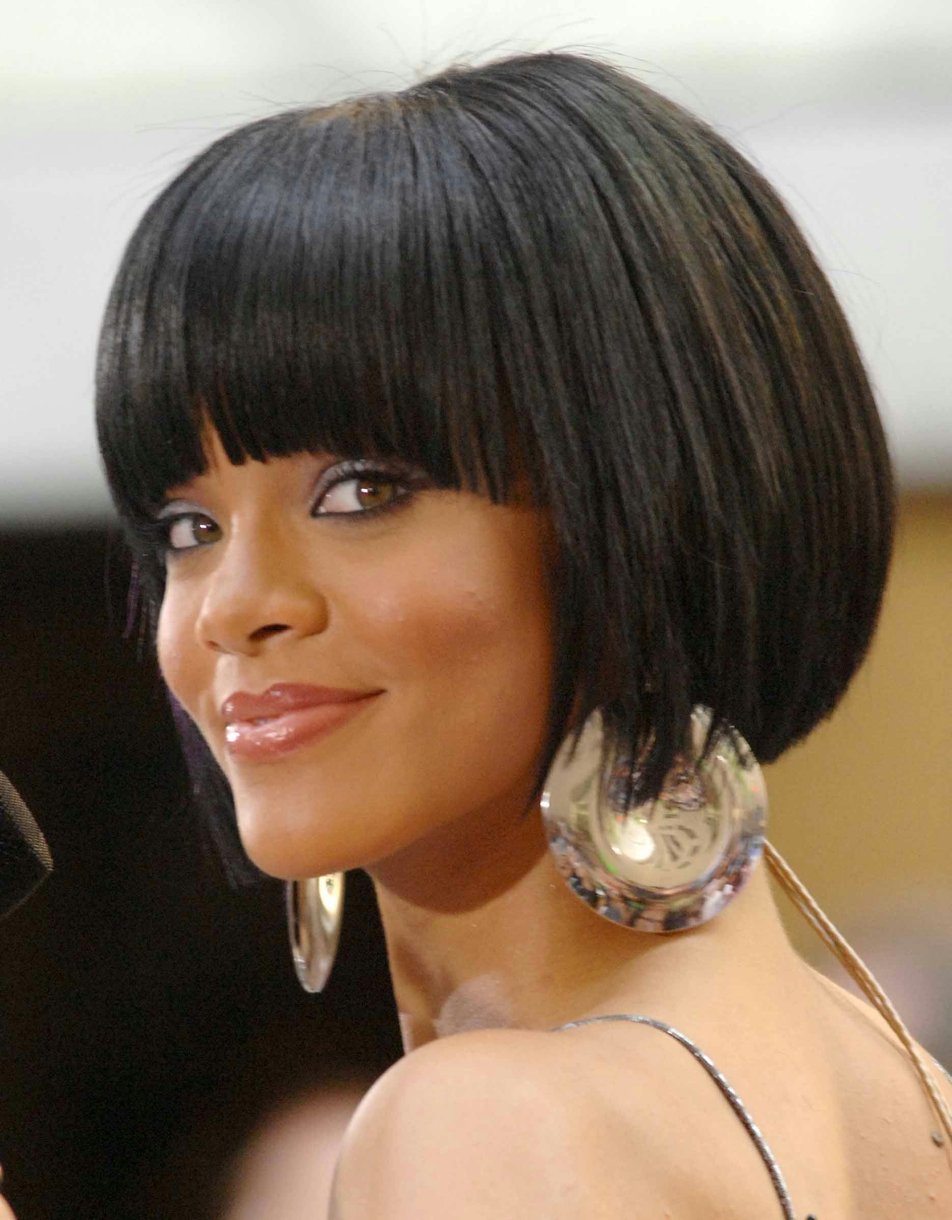 Rihanna's Hair Evolution, From Side Bangs To Water Waves