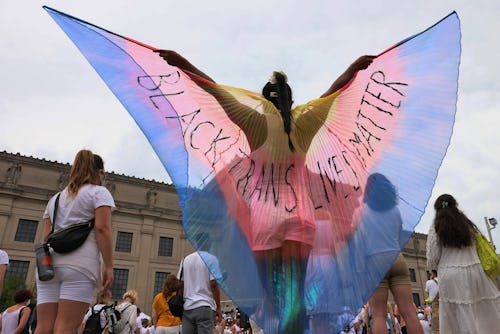 NEW YORK, NEW YORK - JUNE 13: A person spreads wings with the words "Black Trans Lives Matter" writt...
