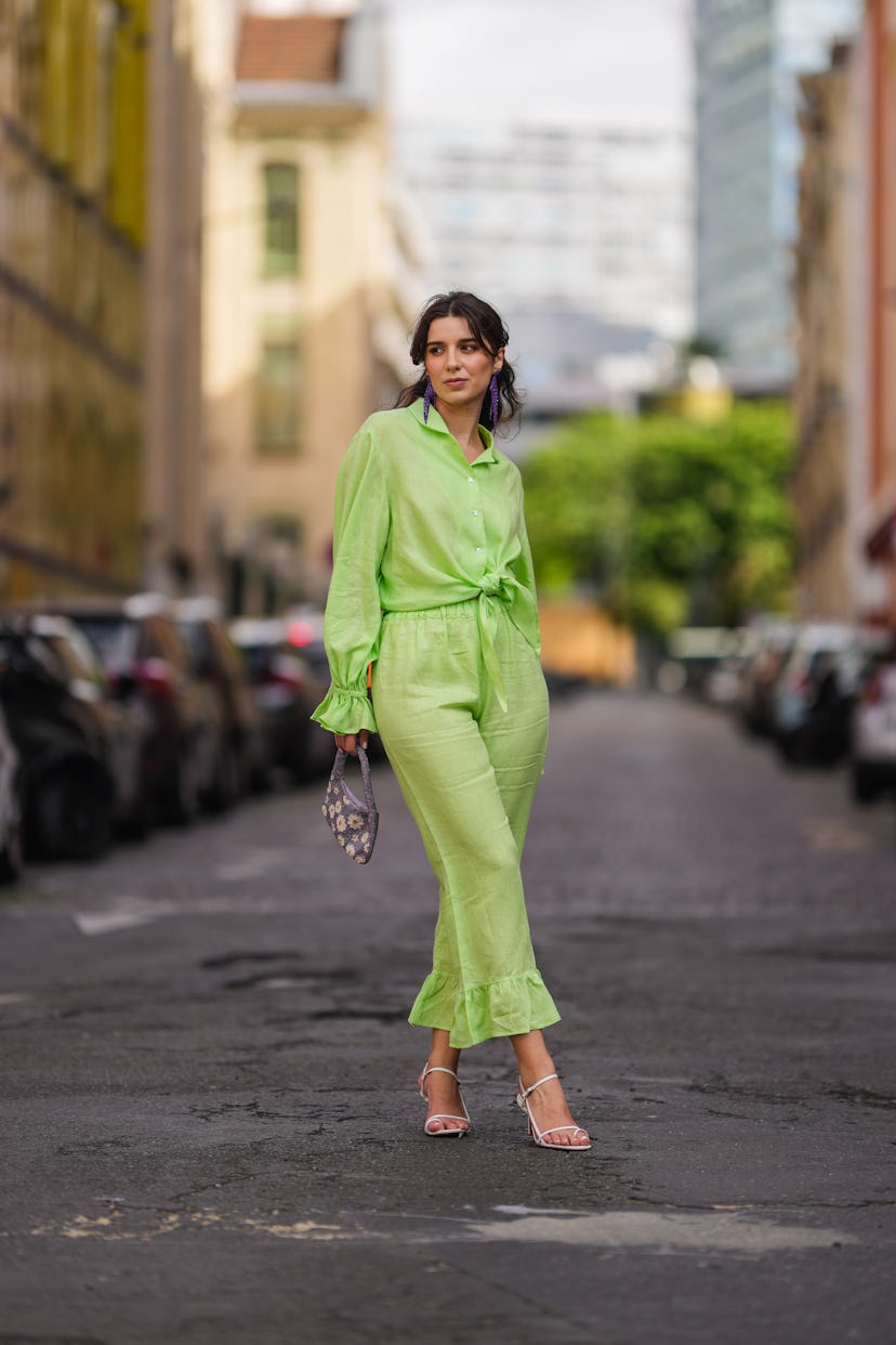 Ketevan Giorgadze in green two-piece look and strappy sandals