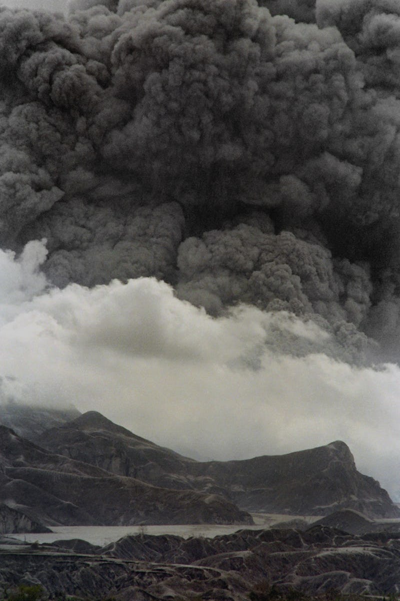 A lake of volcanic mudflow lies trapped at the slopes of Mount Pinatubo on June 28, 1991 as the volc...
