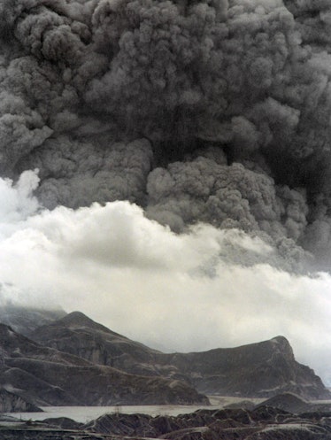 A lake of volcanic mudflow lies trapped at the slopes of Mount Pinatubo on June 28, 1991 as the volc...