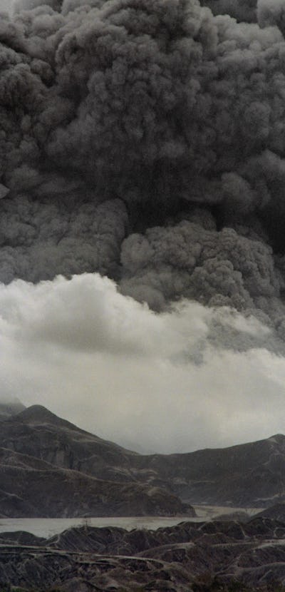 A lake of volcanic mudflow lies trapped at the slopes of Mount Pinatubo on June 28, 1991 as the volc...