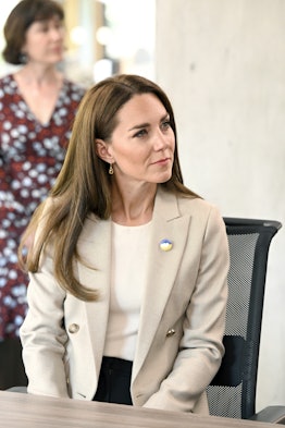 Kate Middleton wears a Reiss cream blazer in London