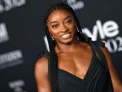 Simone Biles at the InStyle Awards before her floral, orange manicure.