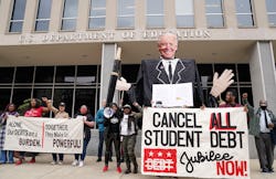 WASHINGTON, DC - APRIL 04: Supporters of The Debt Collective convene at the U.S. Department of Educa...