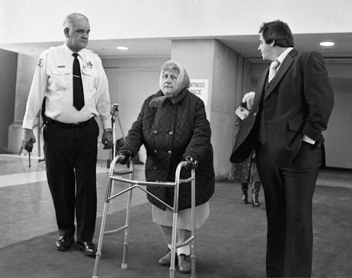 Mrs. Marion Gacy, 72, mother of mass sex-murder suspect John Wayne Gacy, leaves courtroom after test...
