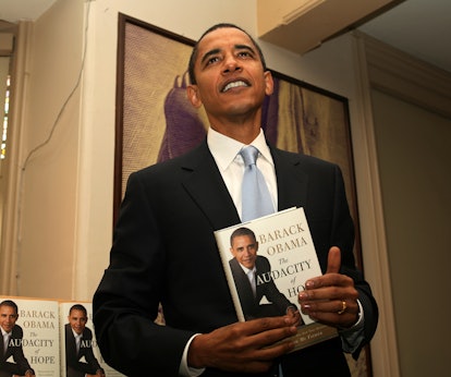 Senator Barack Obama holds a copy of his new best selling book, "The Audacity of Hope" at the Union ...