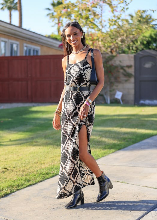 Jasmine Tookes wears a black and white crochet dress to coachella 2022