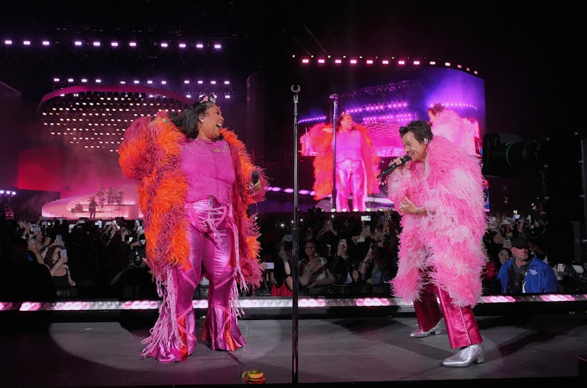 INDIO, CALIFORNIA - APRIL 22: (L-R) Lizzo and Harry Styles perform on the Coachella stage during the...