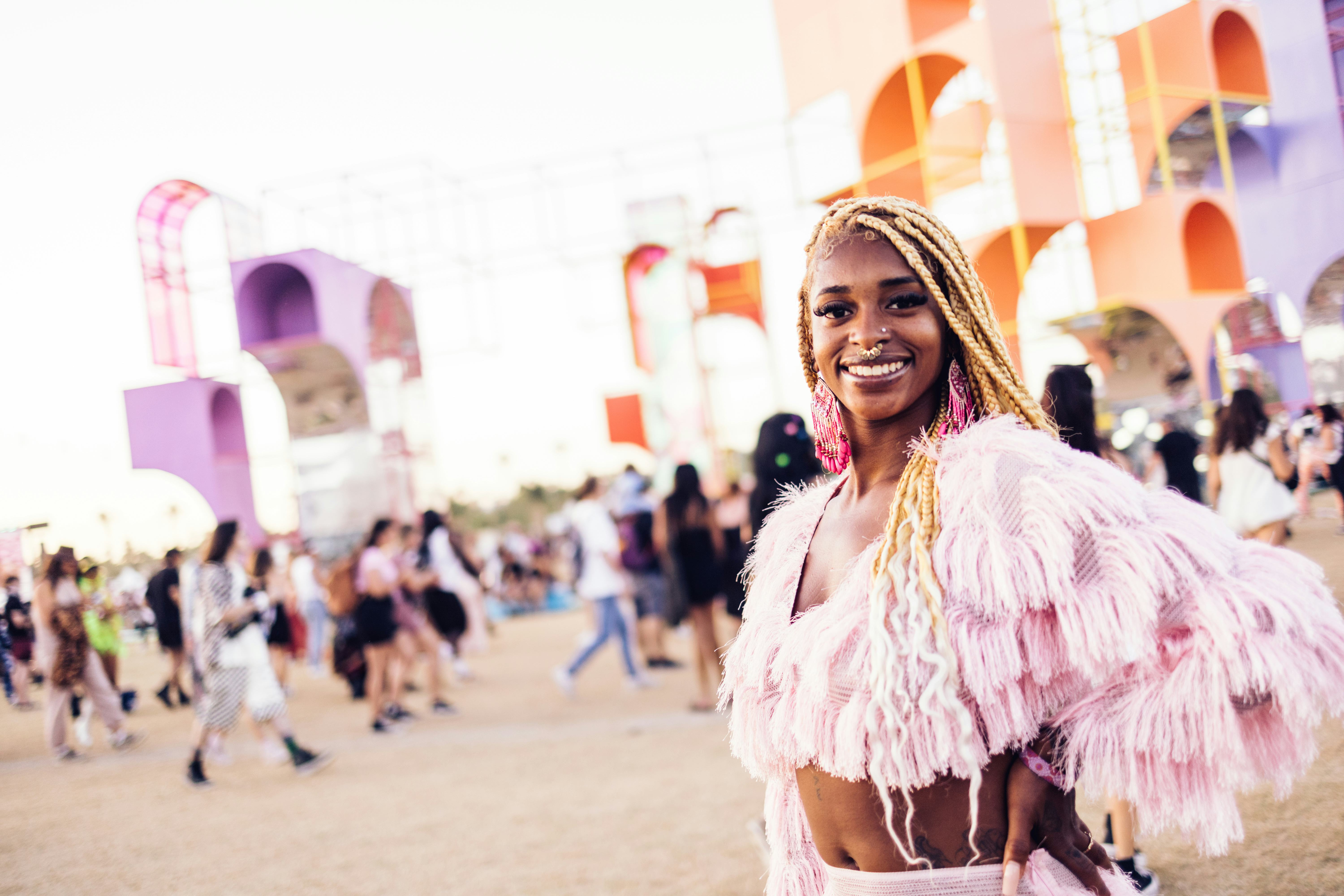 Coachella 2022 street style pink fringe crop top and mini skirt