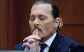 Actor Johnny Depp testifies in the courtroom at the Fairfax County Circuit Courthouse in Fairfax, Vi...