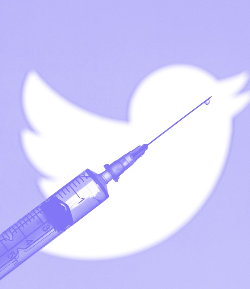 SPAIN - 2021/03/03: In this photo illustration a medical syringe seen displayed in front of the Twit...