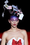 A model walks the runway wearing all over eyeshadow at the Brain & Beast fashion show during Mercede...