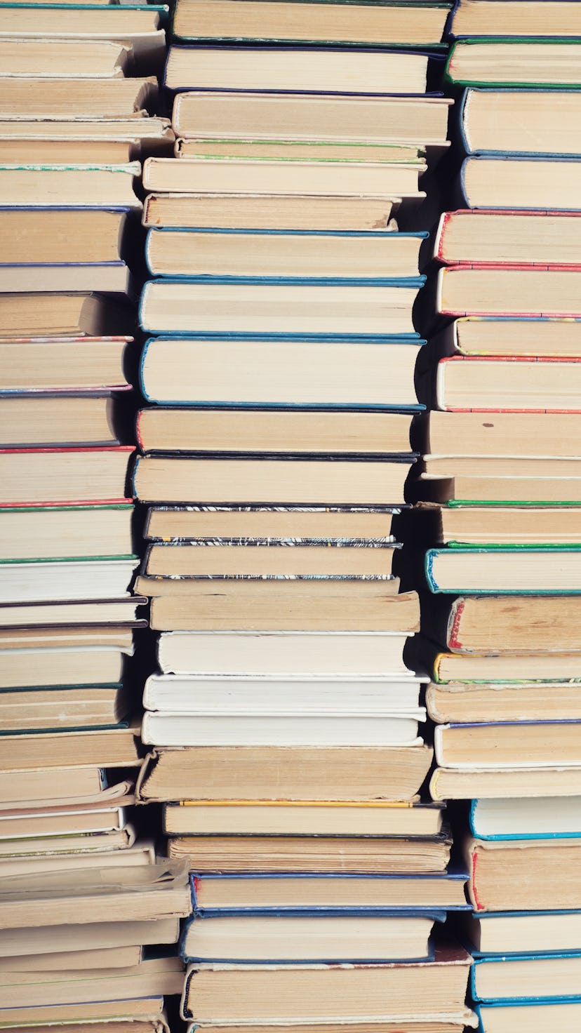 Rear view of three stacks of books