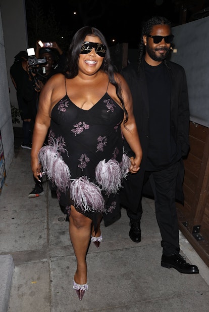 Lizzo is seen leaving Craig's on April 26, 2022 in Los Angeles, California. 