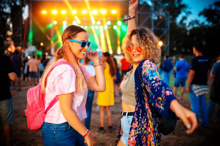 Friends at a concert, which is an idea for what to do on Friday night.