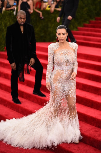 Kim Kardashian and Kanye West attend the "China: Through The Looking Glass" Costume Institute Benefi...