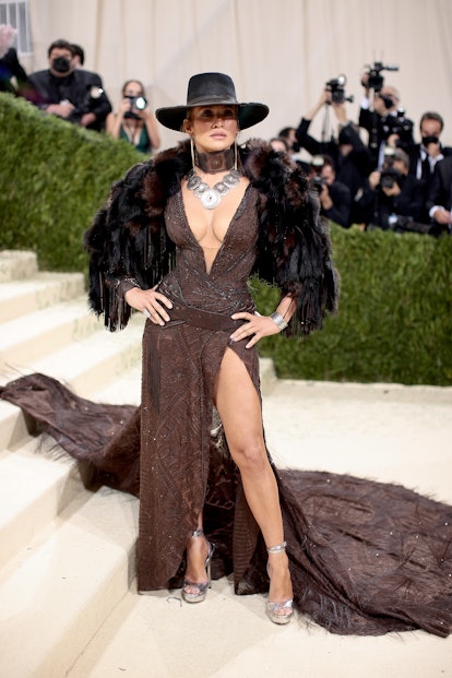 Jennifer Lopez attends The 2021 Met Gala Celebrating In America: A Lexicon Of Fashion wearing a brow...