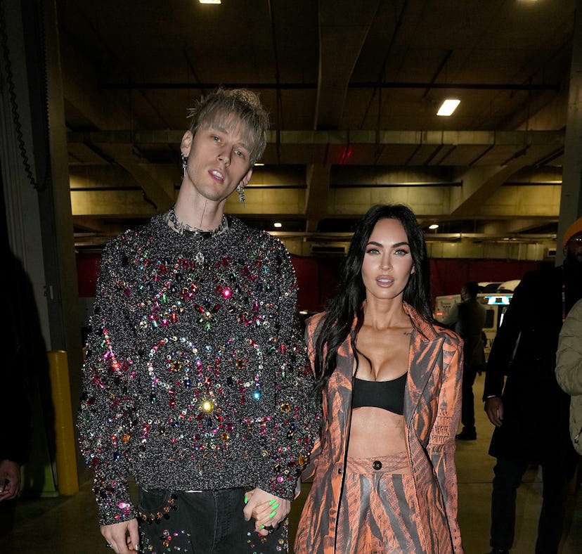 CLEVELAND, OHIO - FEBRUARY 20: (L-R) Machine Gun Kelly and Megan Fox attend the 2022 NBA All-Star Ga...