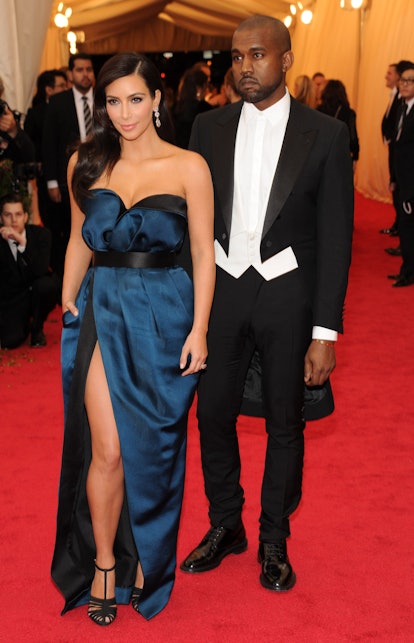 Kim Kardashian and Kanye West attend  the "Charles James: Beyond Fashion" Costume Institute Gala at ...