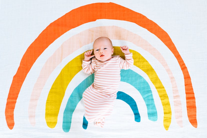 One Mother's Day baby announcement idea is to include a rainbow in your photo to honor a previous pr...