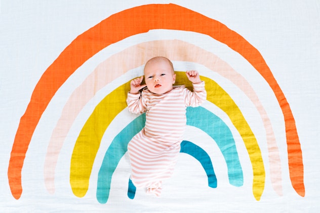 One Mother's Day baby announcement idea is to include a rainbow in your photo to honor a previous pr...