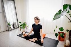 Young girl meditating in lotus pose. Here’s your daily horoscope for April 27, 2022. 