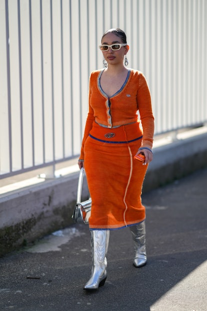 A guest wears a knit set in Milan Italy