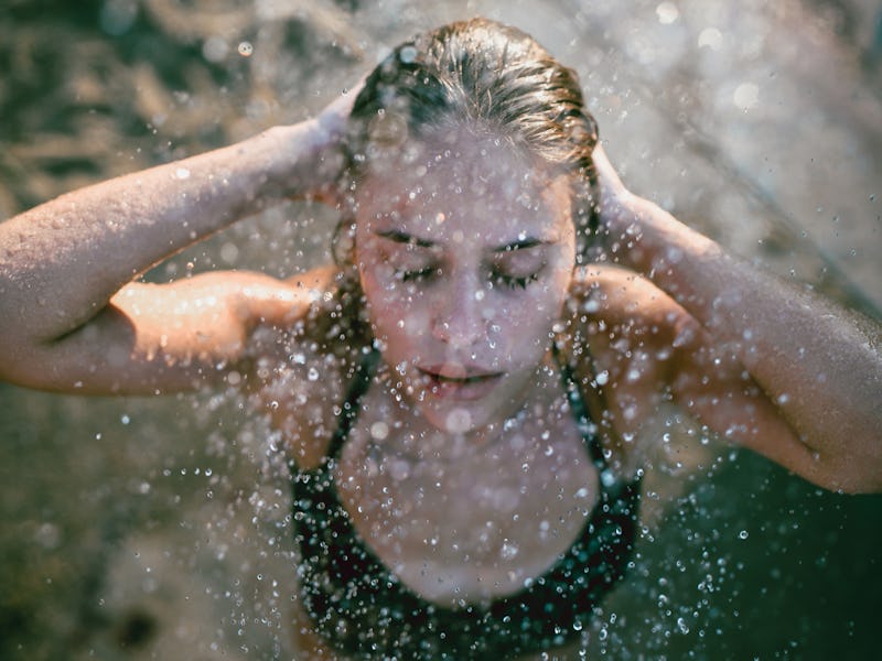 Adorable Blonde Enjoying Cold Shower At The Beach