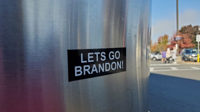 A sticker with the political slogan Let's Go Brandon is visible on a trash can in Pleasant Hill, Cal...
