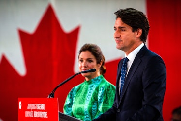 Canadian Prime Minister Justin Trudeau, flanked by wife Sophie Gregoire-Trudea, delivers his victory...