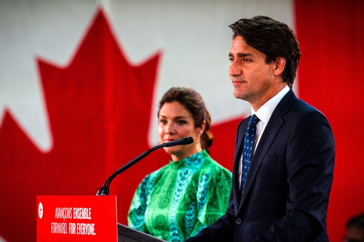 Canadian Prime Minister Justin Trudeau, flanked by wife Sophie Gregoire-Trudea, delivers his victory...