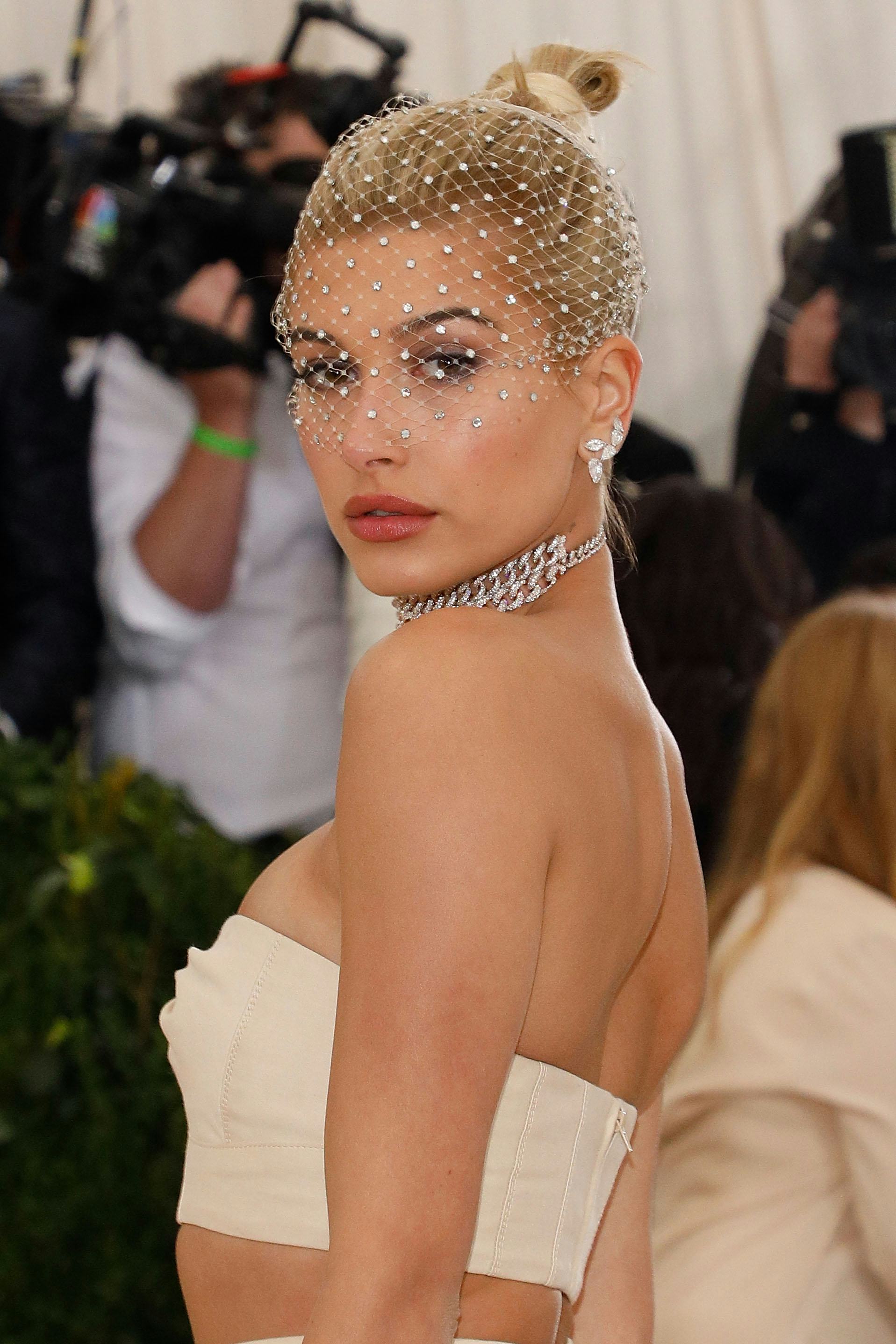 Hailey Bieber&rsquo;s best Met Gala hairstyles, including a pink bob haircut, beachy waves, and a barbie p&hellip;