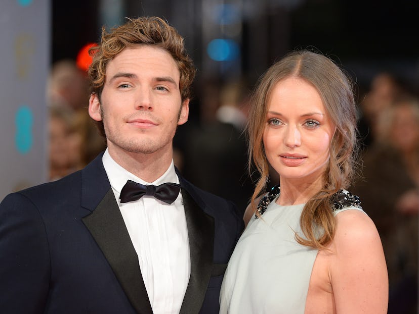 Sam Claflin and Laura Haddock arriving at The EE British Academy Film Awards 2014