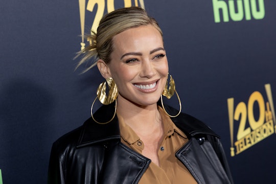 Hilary Duff's 1-year-old daughter is all smiles while eating chicken nuggets.