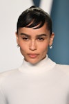  Zoë Kravitz, with fluffy brows and bangs, attends the 2022 Vanity Fair Oscar Party with fluffy brow...