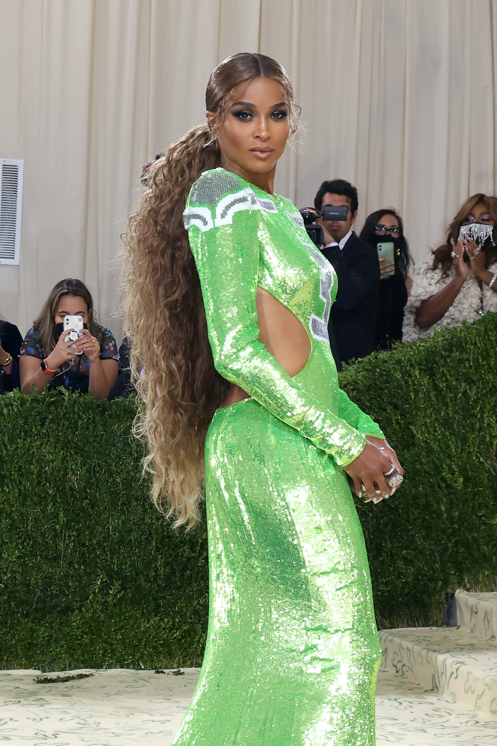 Ciara honey blonde hair color in glittery Seahawks dress at Met Gala 2021